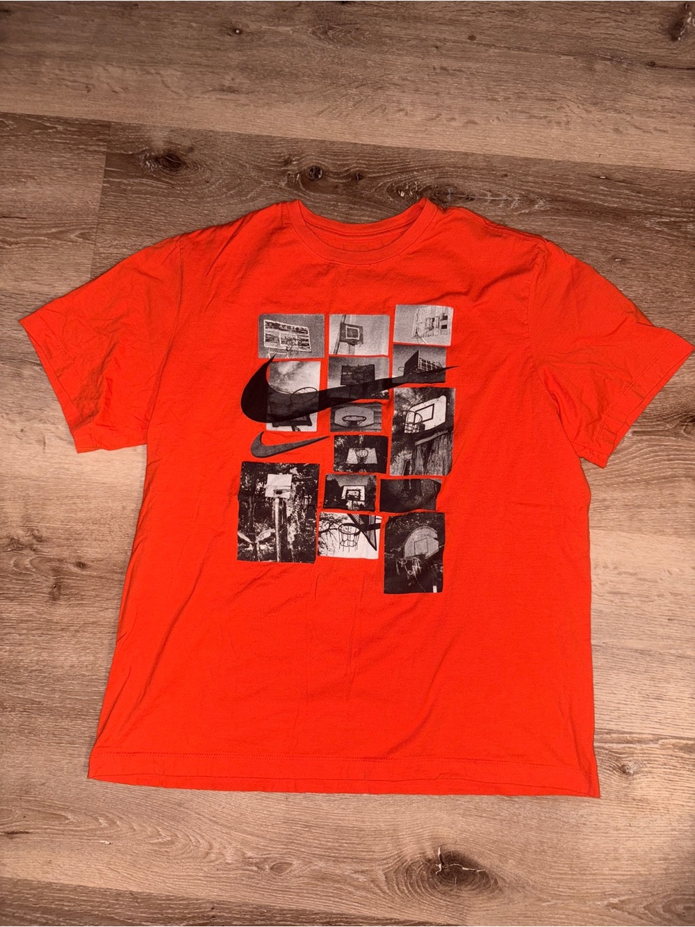 Nike Bright Orange Short-Sleeve Graphic Tee with Black Print